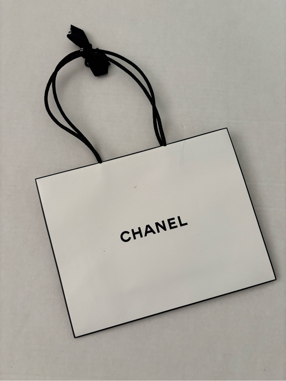 Chanel paper bag small white